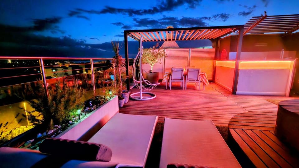 View (from property/room), Balcony/Terrace, Seating area, Swimming pool