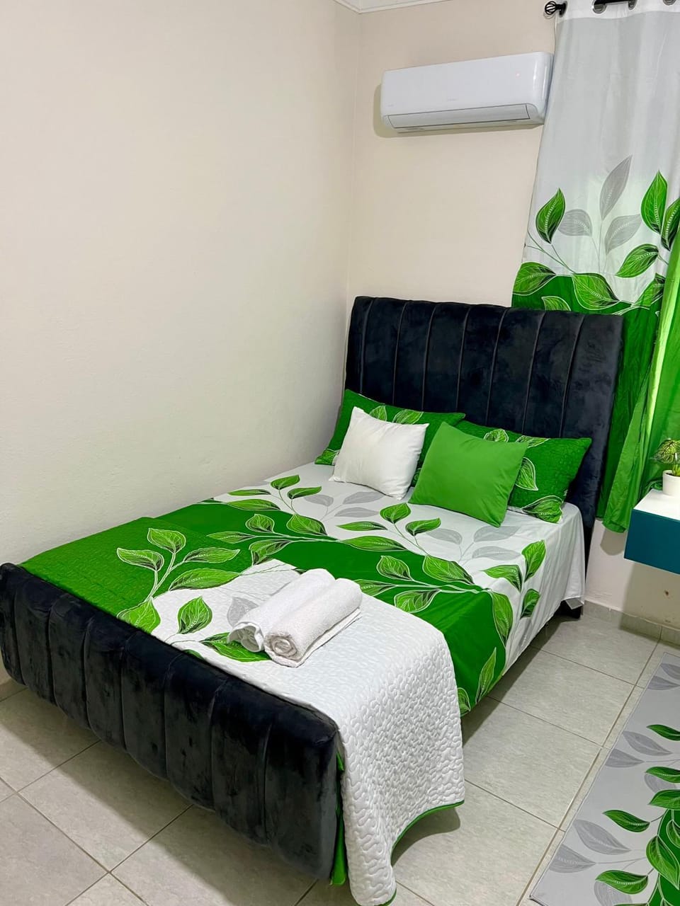 Bed, towels, air conditioner