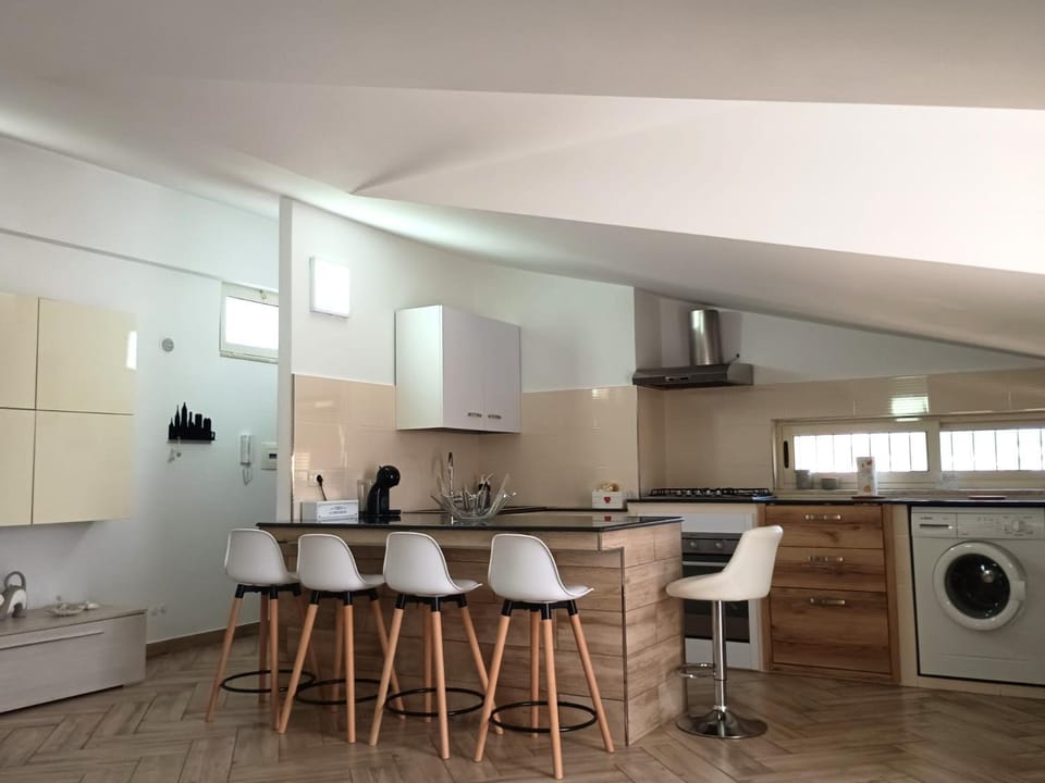 Kitchen or kitchenette, Living room, Dining area, oven, stove, laundry, air conditioner