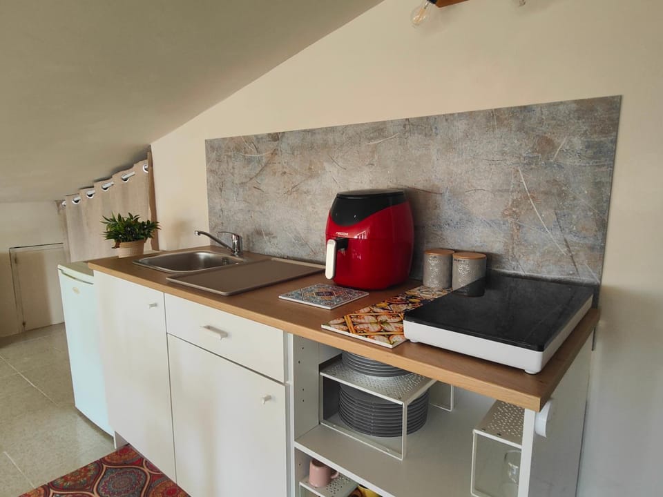 Kitchen or kitchenette, stove, toaster, kitchen