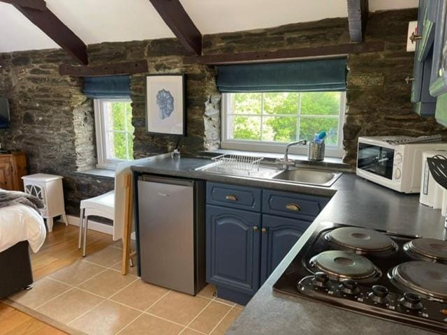Kitchen or kitchenette, stove