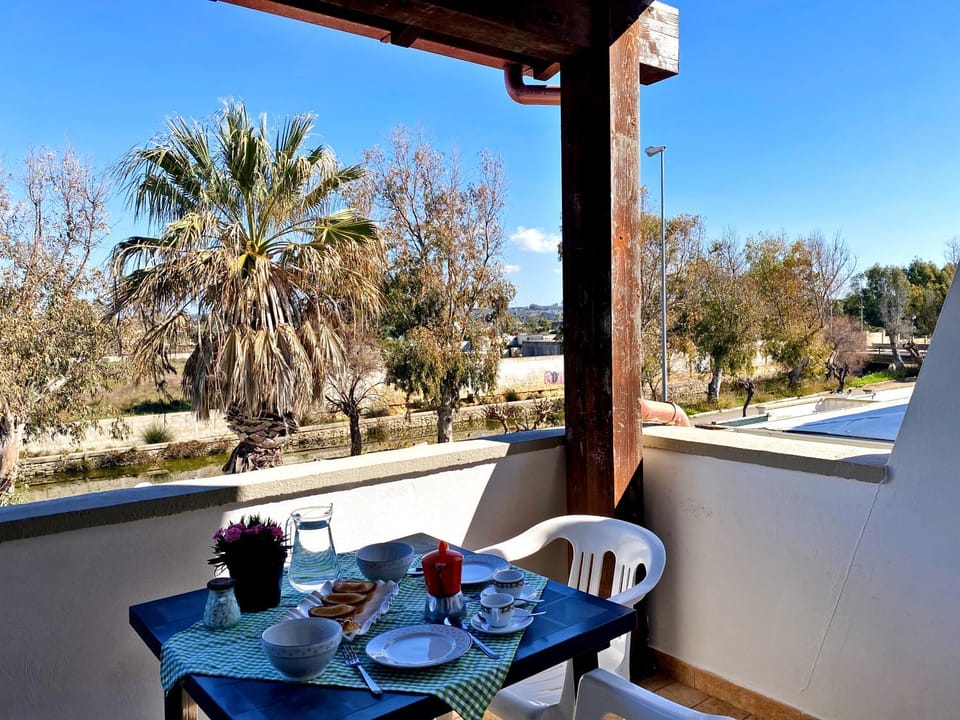 Property building, Patio, Day, View (from property/room), Balcony/Terrace, Dining area
