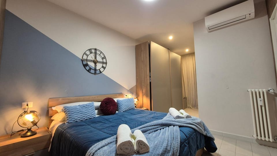 Bed, Photo of the whole room, Bedroom, towels, wardrobe, air conditioner
