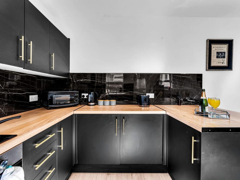 Kitchen or kitchenette, oven, stove, toaster