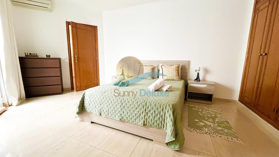 Bed, Bedroom, towels, wardrobe, air conditioner