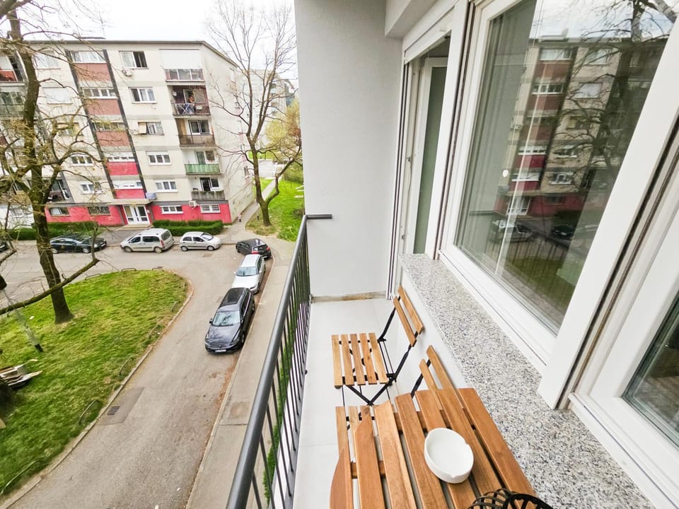 Property building, Patio, Day, Neighbourhood, View (from property/room), Balcony/Terrace, Street view, Location
