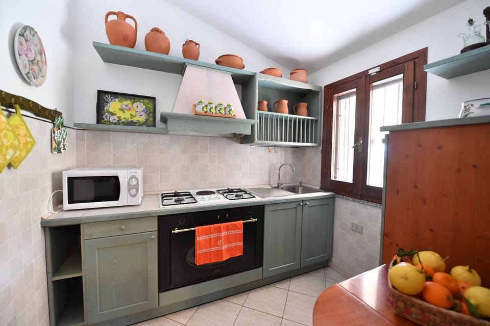 Kitchen or kitchenette, oven, stove, toaster