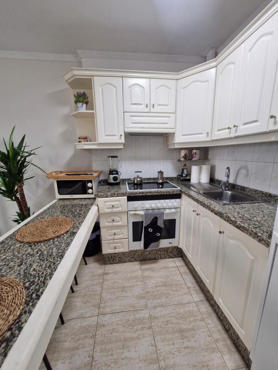 Kitchen or kitchenette, stove