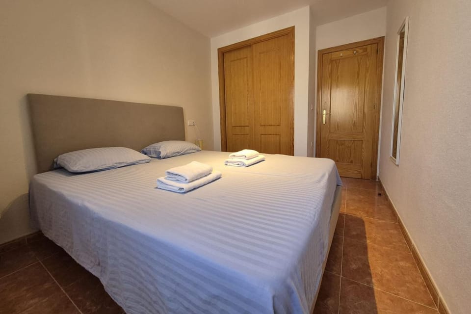 Bed, Photo of the whole room, Bedroom, towels, air conditioner