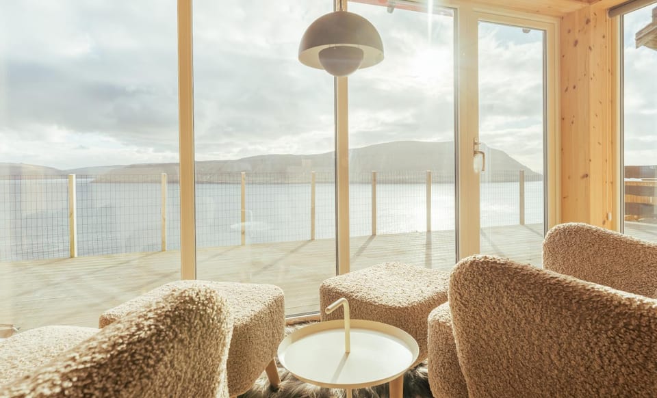 Natural landscape, Living room, Seating area, Mountain view, Sea view