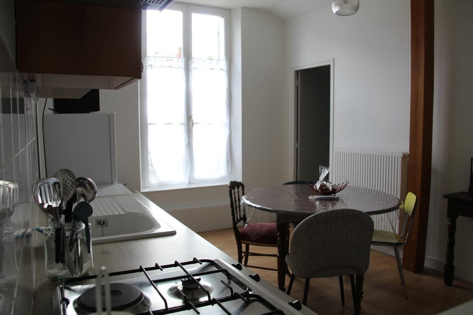 Dining area, microwave, stove, toaster, kitchen