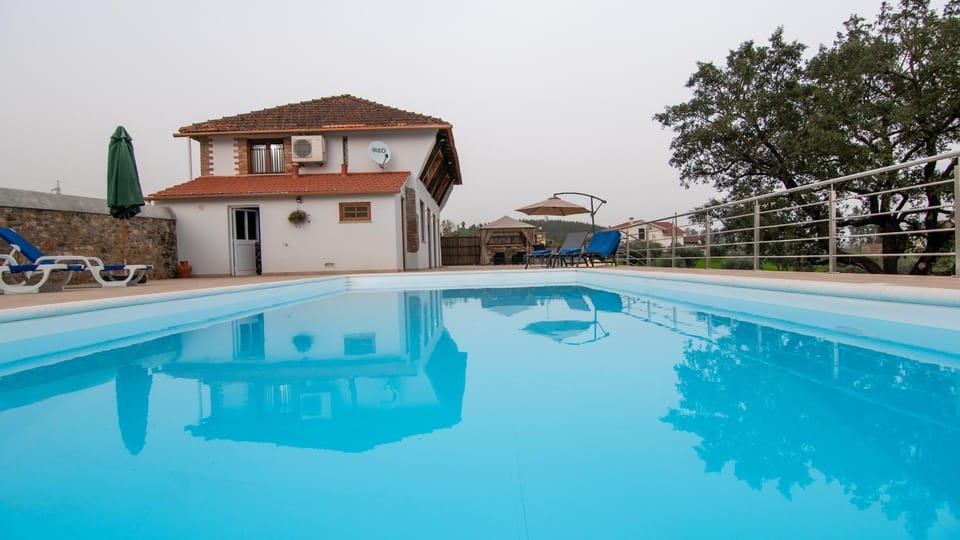 Swimming pool, sunbed