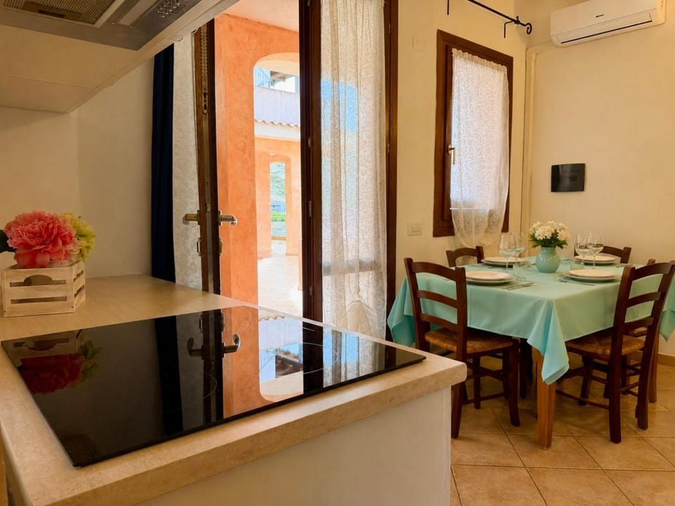 Dining area, stove, air conditioner