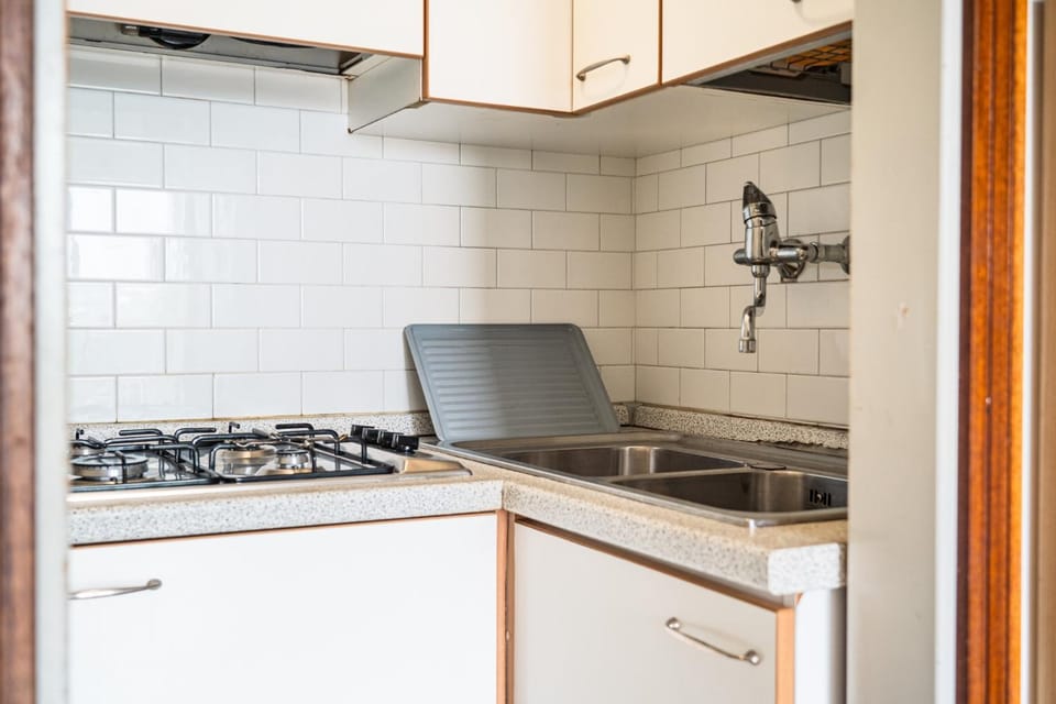 Kitchen or kitchenette, stove