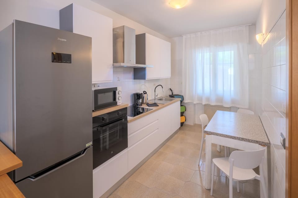 Kitchen or kitchenette, Dining area, dishwasher, stove, toaster