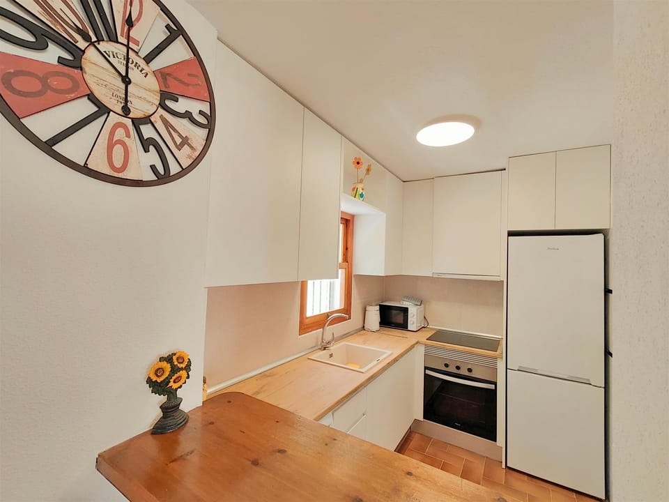 Kitchen or kitchenette, microwave, oven, stove, washing machine, kitchen, kitchen