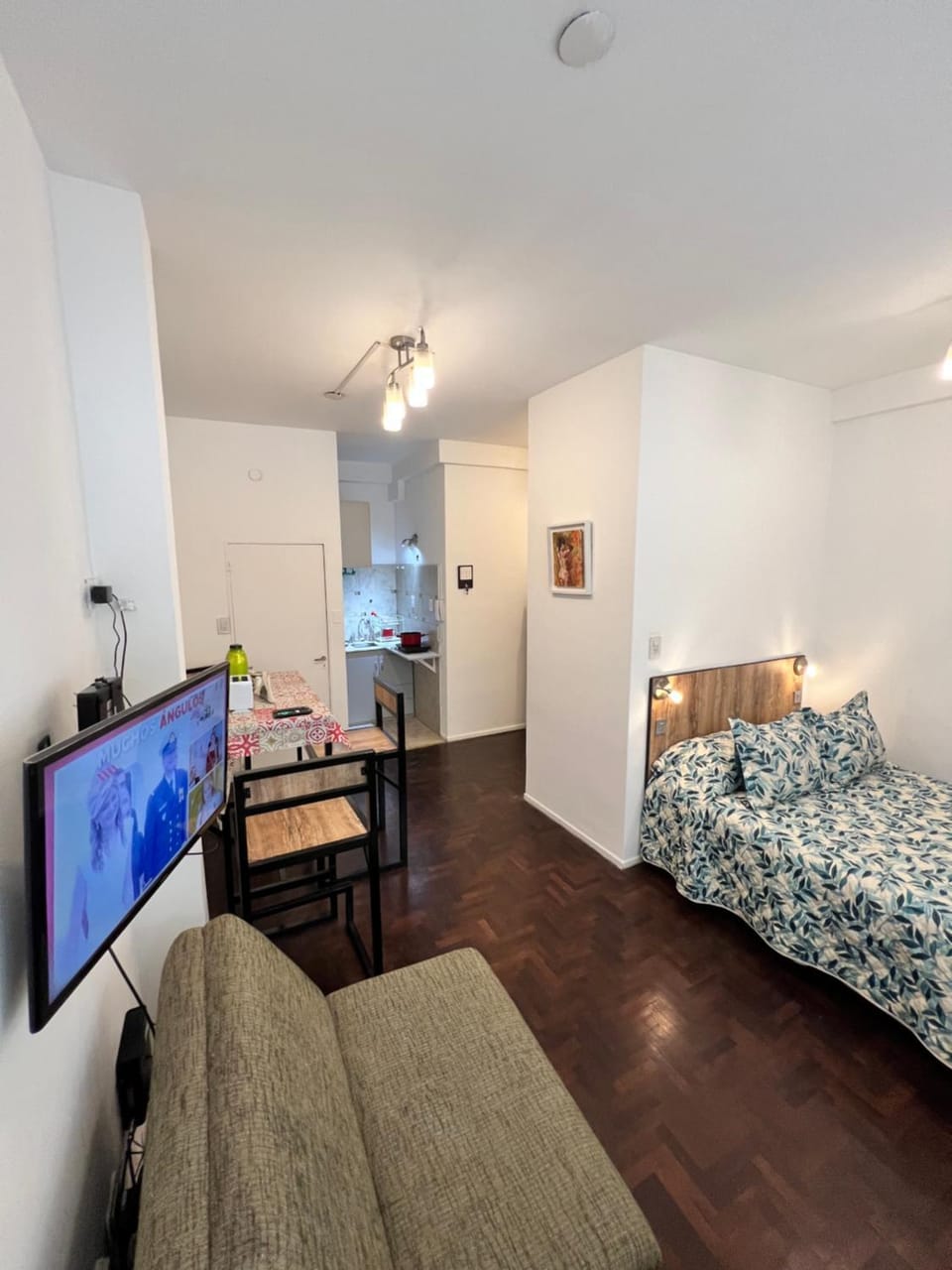 Bed, TV and multimedia, Kitchen or kitchenette, Living room, Photo of the whole room, Seating area, Bedroom