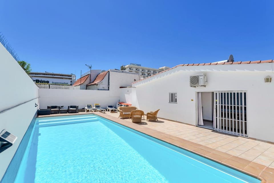 Property building, Living room, Swimming pool