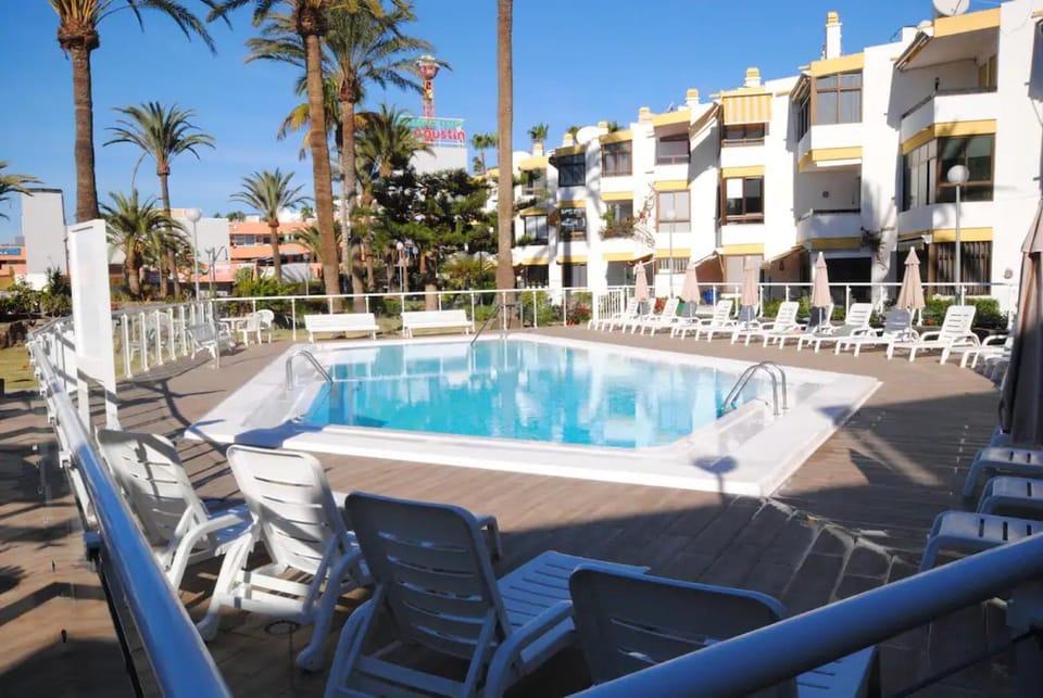 Property building, Living room, Swimming pool