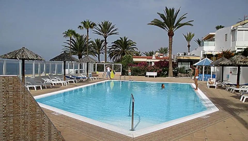 Property building, Living room, Swimming pool
