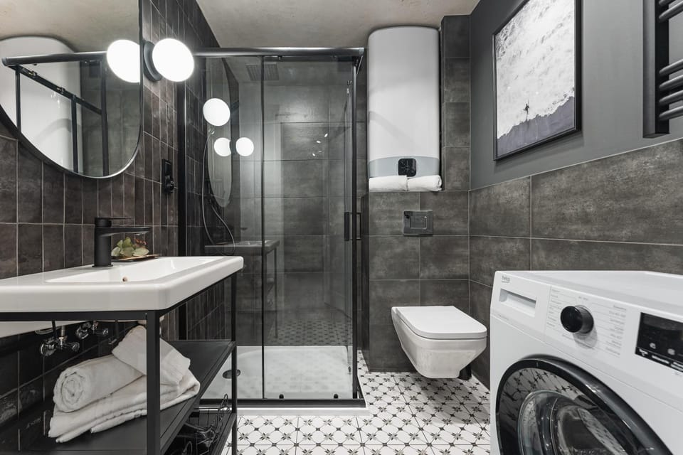 Shower, Toilet, Bathroom, towels, washing machine, dryer