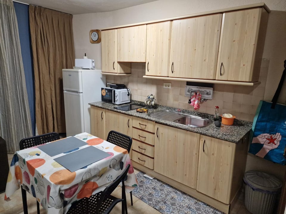 Dining area, minibar, stove, toaster, kitchen