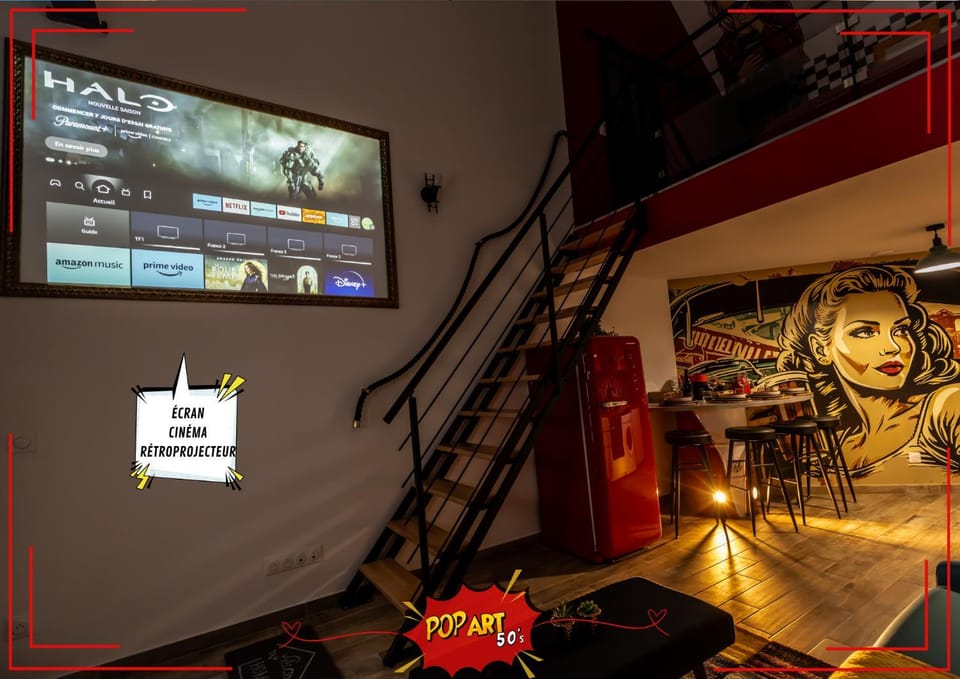 LOFT "POP ART 50's" - Cinéma rétroprojecteur - WIFI Fibre - Borne arcade 5000 jeux - Réalité virtuelle - 2 lits doubles -IDÉAL PROFESSIONNEL & FAMILLE à Saint Etienne Apartment in Saint-Étienne