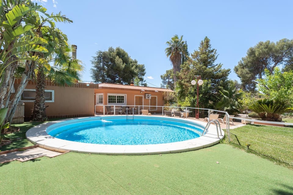 Property building, Living room, Swimming pool