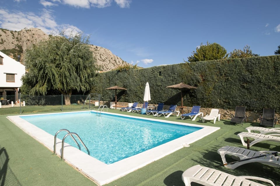 Property building, Living room, Swimming pool