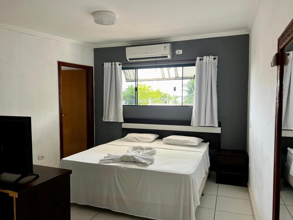 Bed, Photo of the whole room, Bedroom, towels, air conditioner