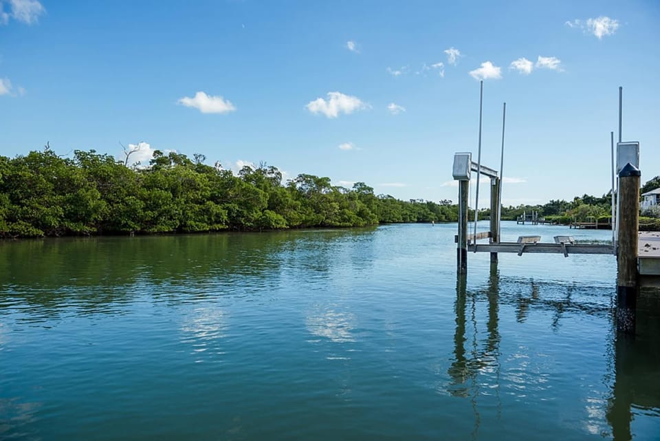 Waterfront Pink House with Private Dock & Pool House in Sanibel Island