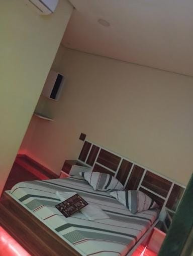 Bed, Photo of the whole room, Bedroom, towels, air conditioner