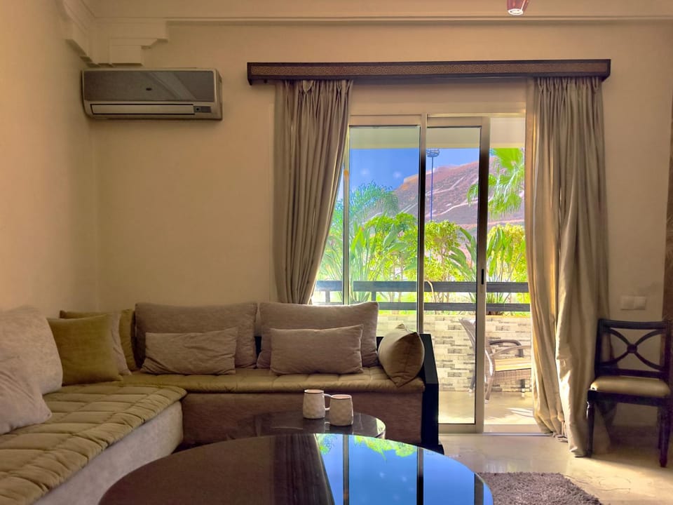 Natural landscape, Living room, Seating area, air conditioner