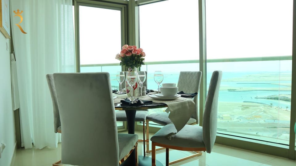 Natural landscape, Living room, Seating area, Dining area, Sea view