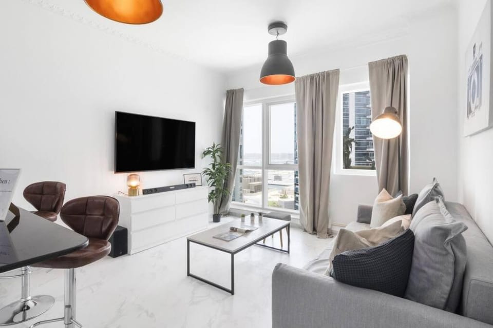Stylish 1BR Apartment with City View Balcony Pool and Parking Apartment in Dubai