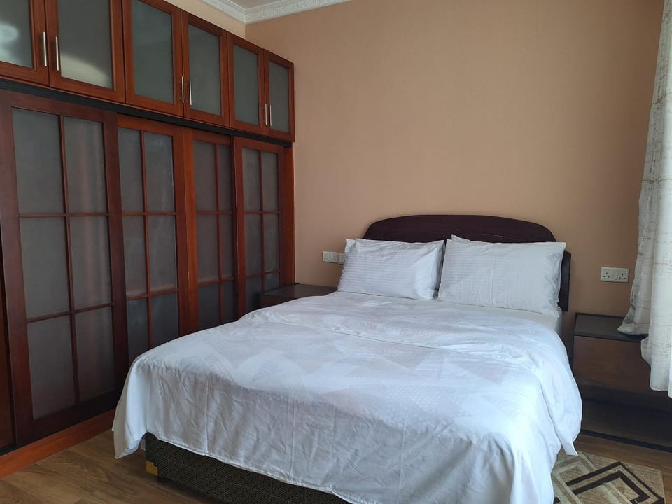 Bed, wardrobe