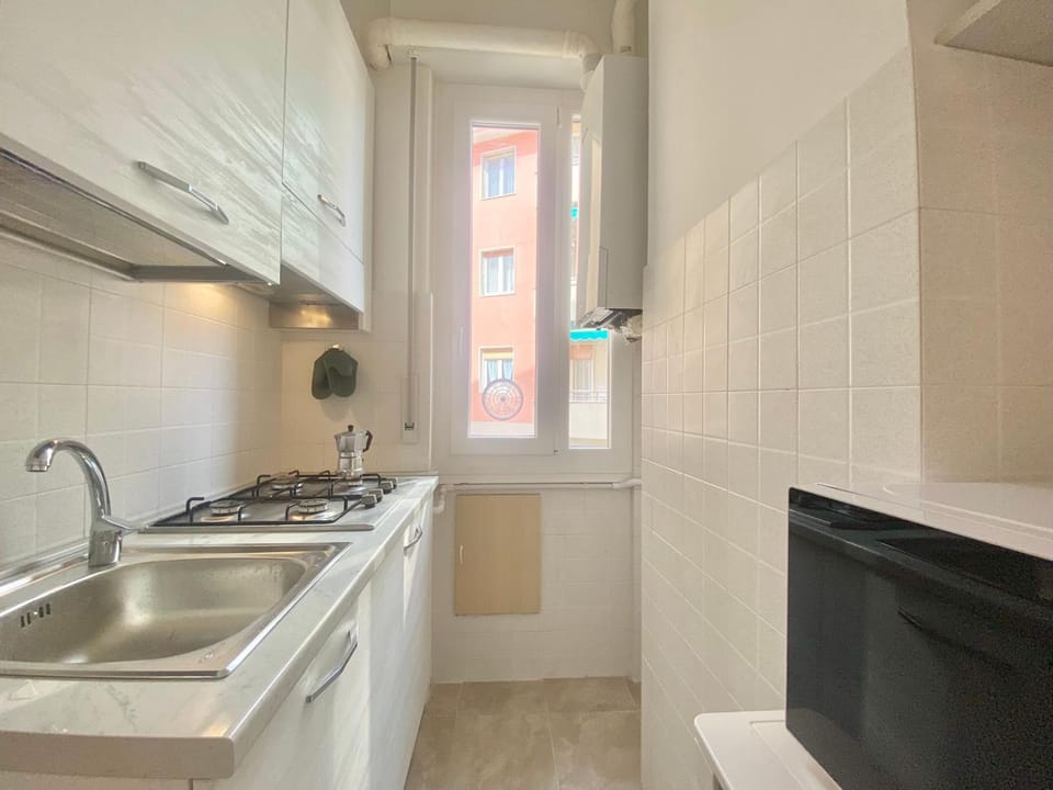 Kitchen or kitchenette, stove