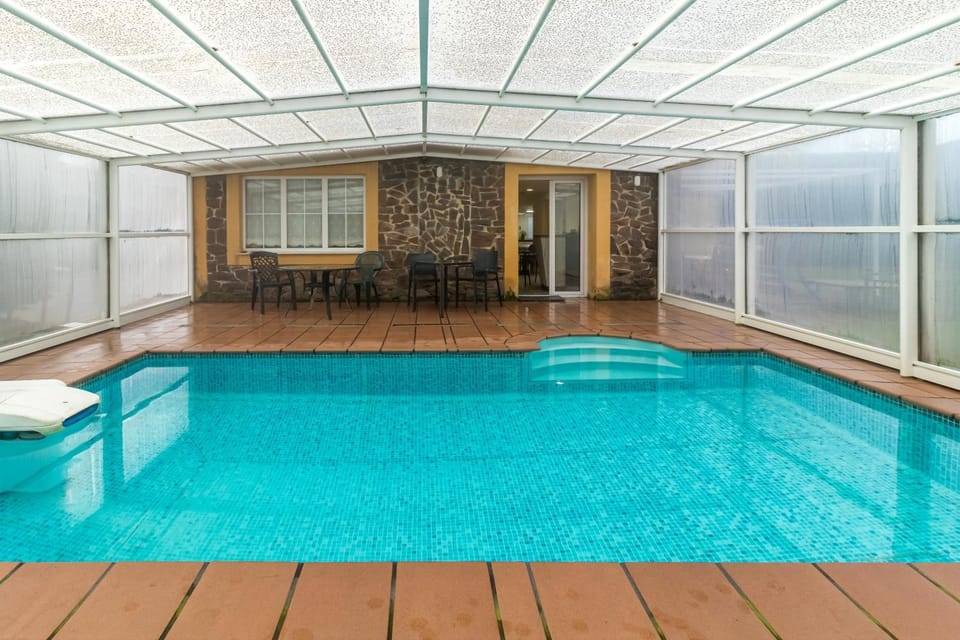 Property building, Living room, Swimming pool