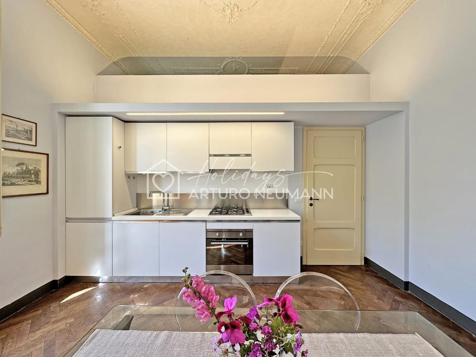 Kitchen or kitchenette, dishwasher, oven, stove