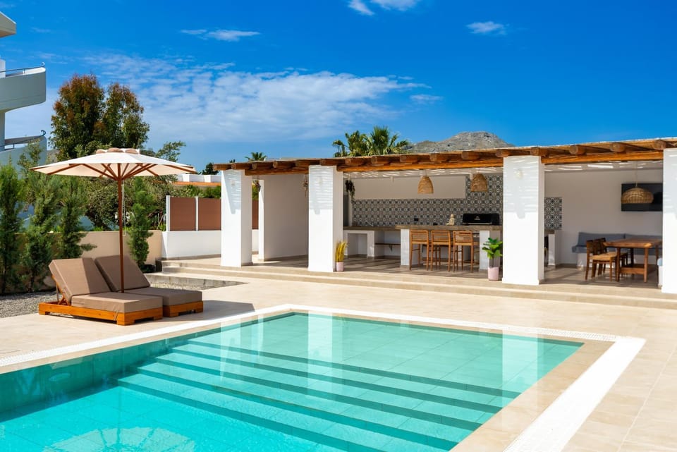Property building, Patio, Swimming pool, sunbed