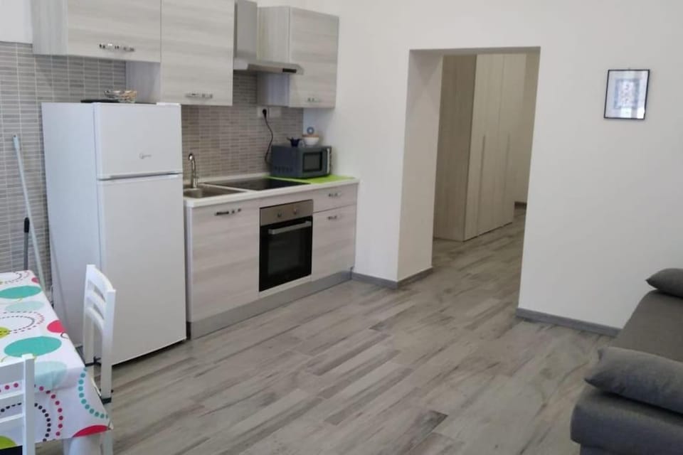 Kitchen or kitchenette, oven, stove