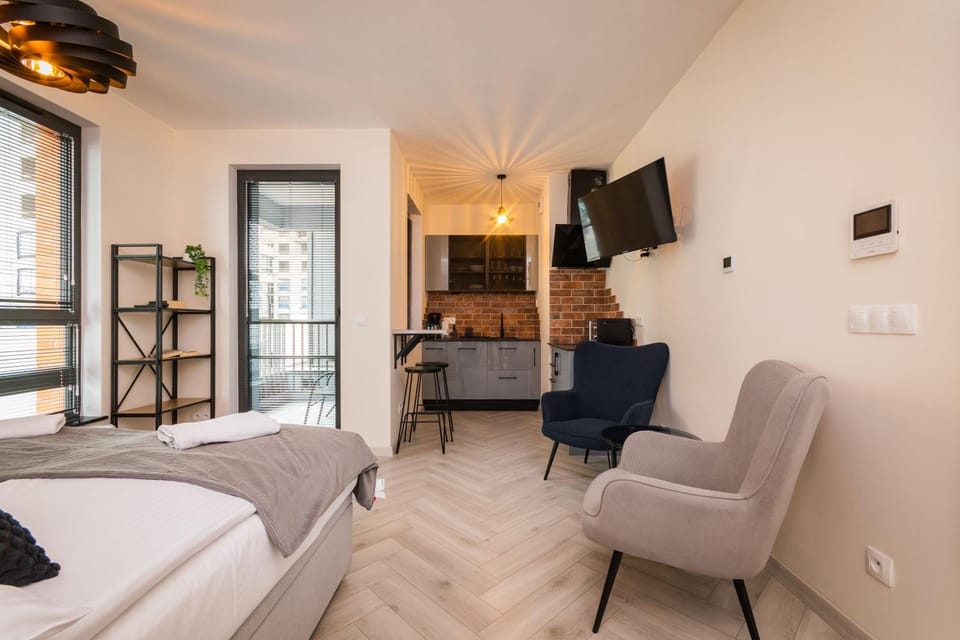 Communal lounge/ TV room, Bed, TV and multimedia, Kitchen or kitchenette, Living room, Photo of the whole room, Seating area, Dining area, Evening entertainment, Bedroom, hair dresser