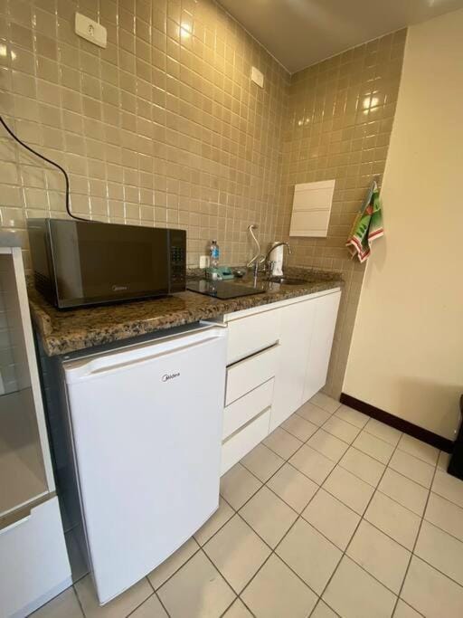 Flat 1 qto, piscina, loc central Apartment in São José dos Pinhais