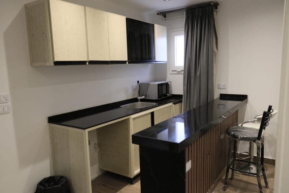 لوكاندة الحصري أكتوبر motel elhosary Apartment hotel in Egypt