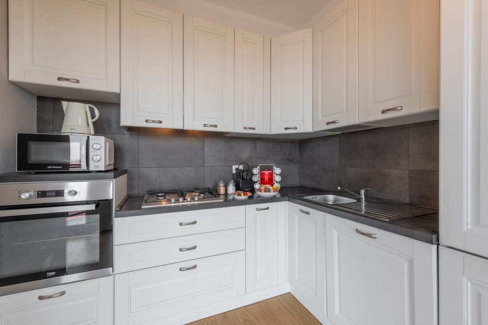 Kitchen or kitchenette, oven, stove
