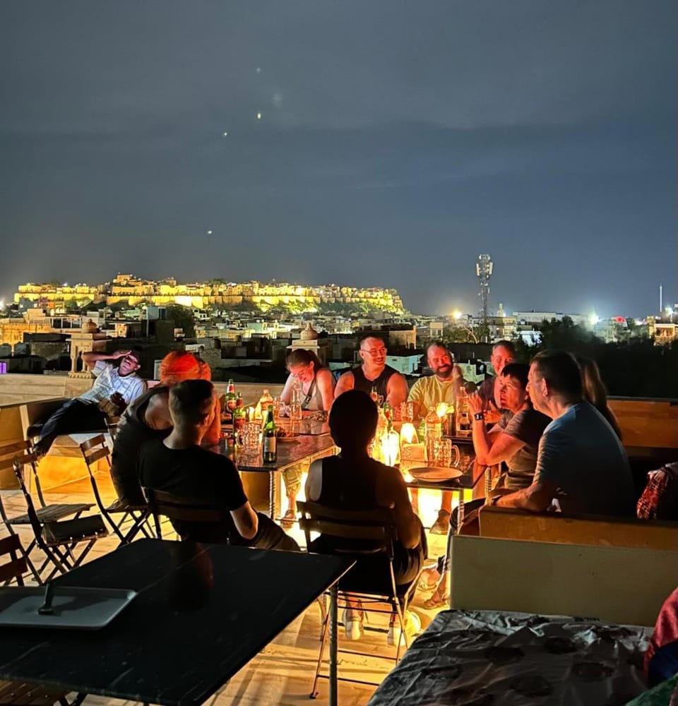 Restaurant/places to eat, Night, People, View (from property/room), Balcony/Terrace, Banquet/Function facilities, Seating area, City view, group of guests