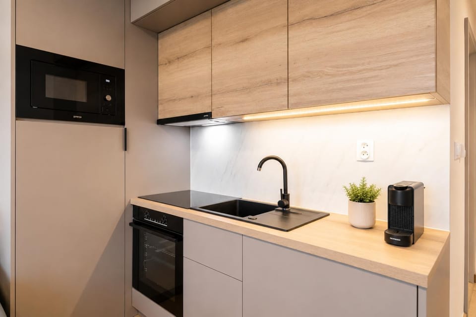 ALURE RESIDENCES 5 & 24h self check-in, private parking in front of the apartment building included, new building, the apartment building has its own park with a lake and outdoor fitness, children's playground, CITY CENTER Apartment in Slovakia