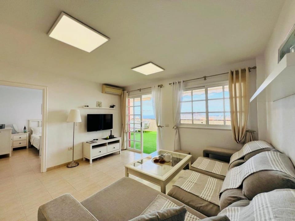TV and multimedia, Living room, Decorative detail, Sea view, furniture, air conditioner