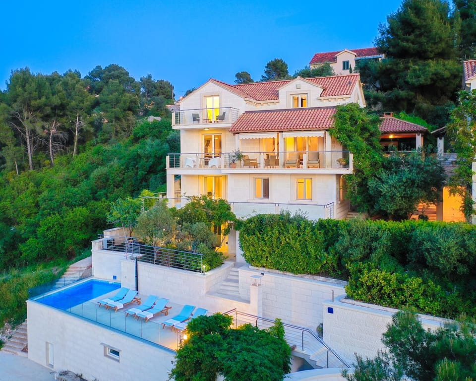 VILLA PHILIPPA - luxurious five-room villa - idyllic location - first row to the sea - spectacular view of the sea bay - unforgettable sunsets - 15 minutes from Supetar ferry port - free parking - private heated pool Villa in Split-Dalmatia County