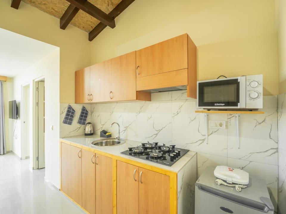 Kitchen or kitchenette, dishwasher, stove, kitchen